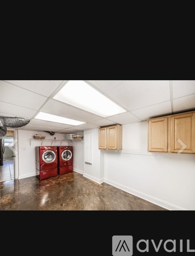 A laundry room with a washer and dryer.