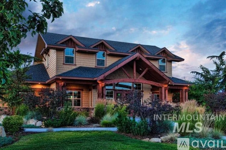 A house with the text "INTERMOUNTAIN MLS" on the side of it.