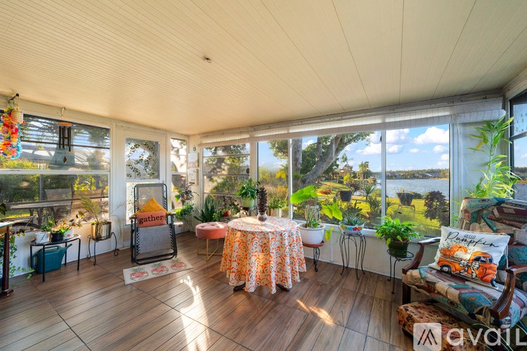 A sunny day in a room with a view of the countryside.