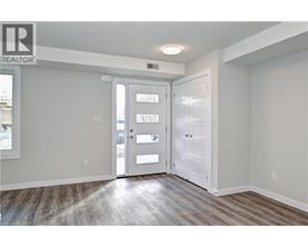 A realtor logo is on the top left corner of the image.