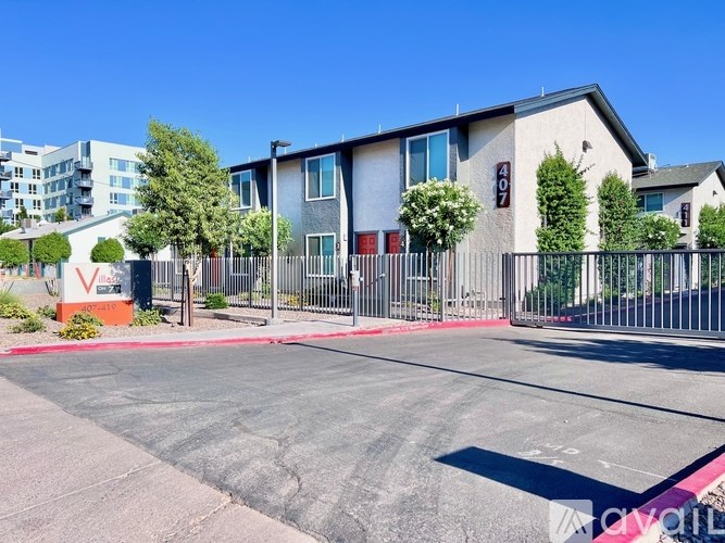 A parking lot in front of a building with a number 40 on it.