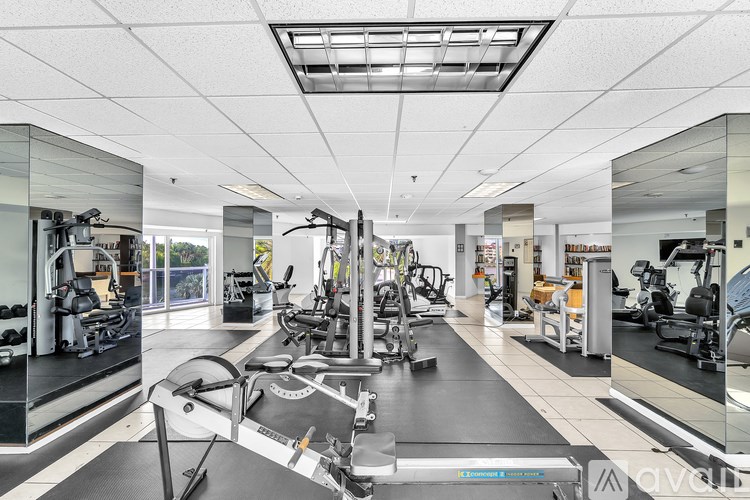 A well-equipped gym with a variety of exercise machines and equipment.