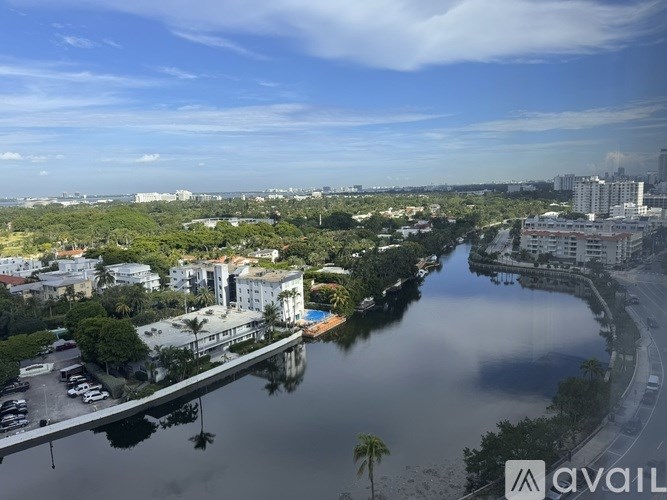 A cityscape with a river running through it.