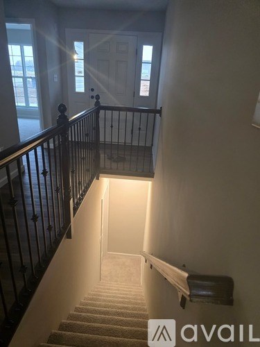 A staircase with a light at the bottom.