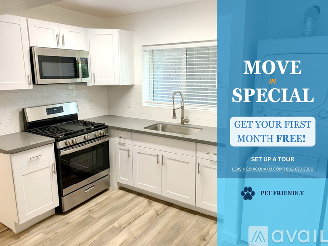 A kitchen with a sign offering a free first month for a move in special.