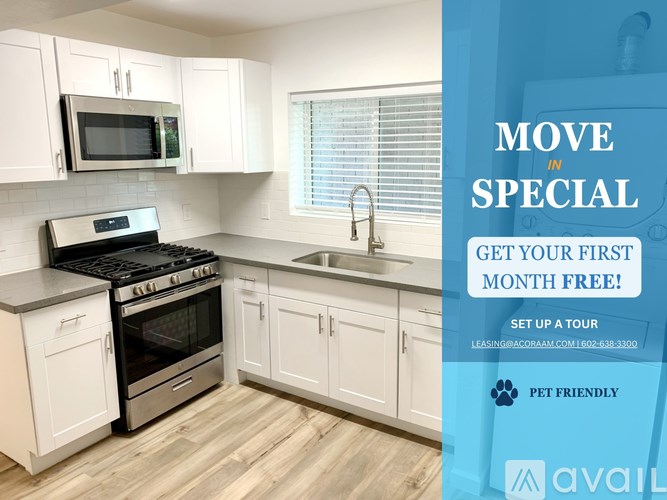 A kitchen with a sign offering a free first month for a move in special.