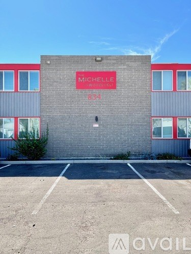 A building with a sign that says "MICHELLE" on it.