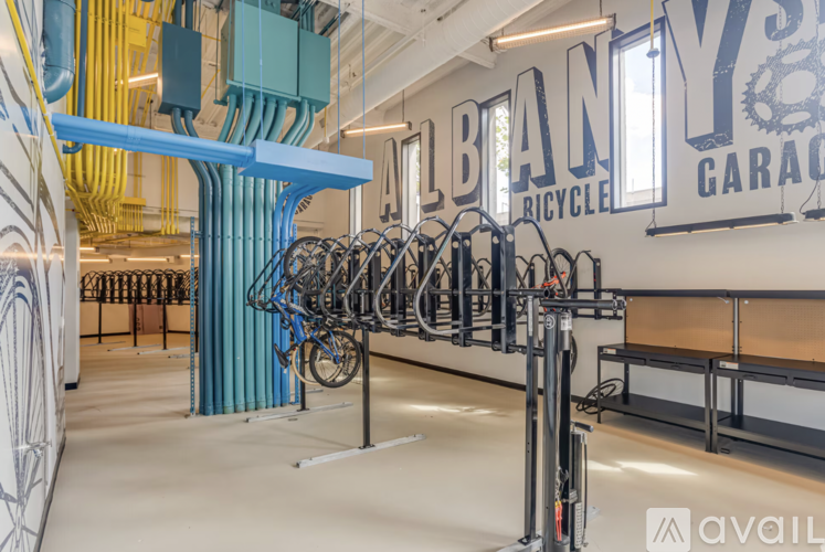 A bike shop with a large number of bicycles on display.