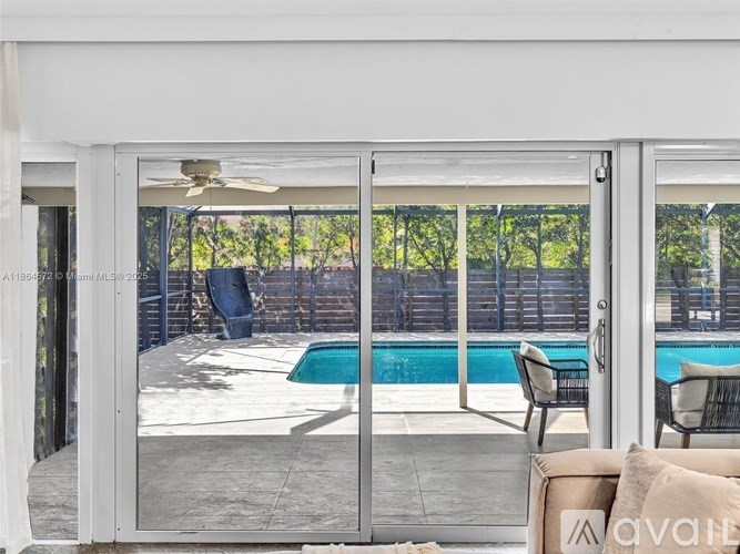 A patio with a pool table and chairs is available for rent.