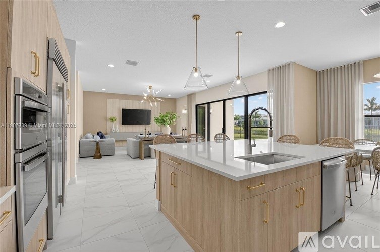 A modern kitchen with wooden cabinets and stainless steel appliances.