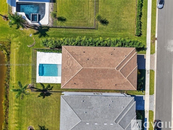 A house with a pool in the backyard.