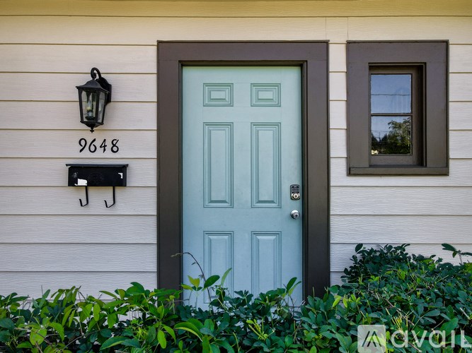 A house number 9648 is displayed on the wall.