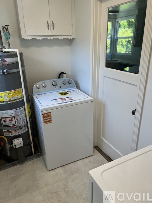 A white oven and fridge in a kitchen.