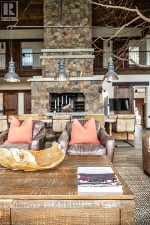 A book is on a coffee table in a living room.