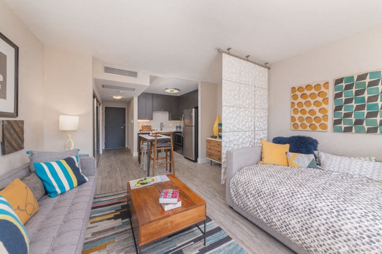 a living room with a couch and a table