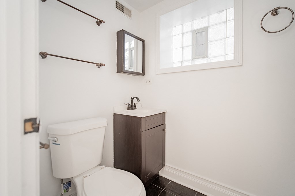 a small bathroom with a toilet and a sink