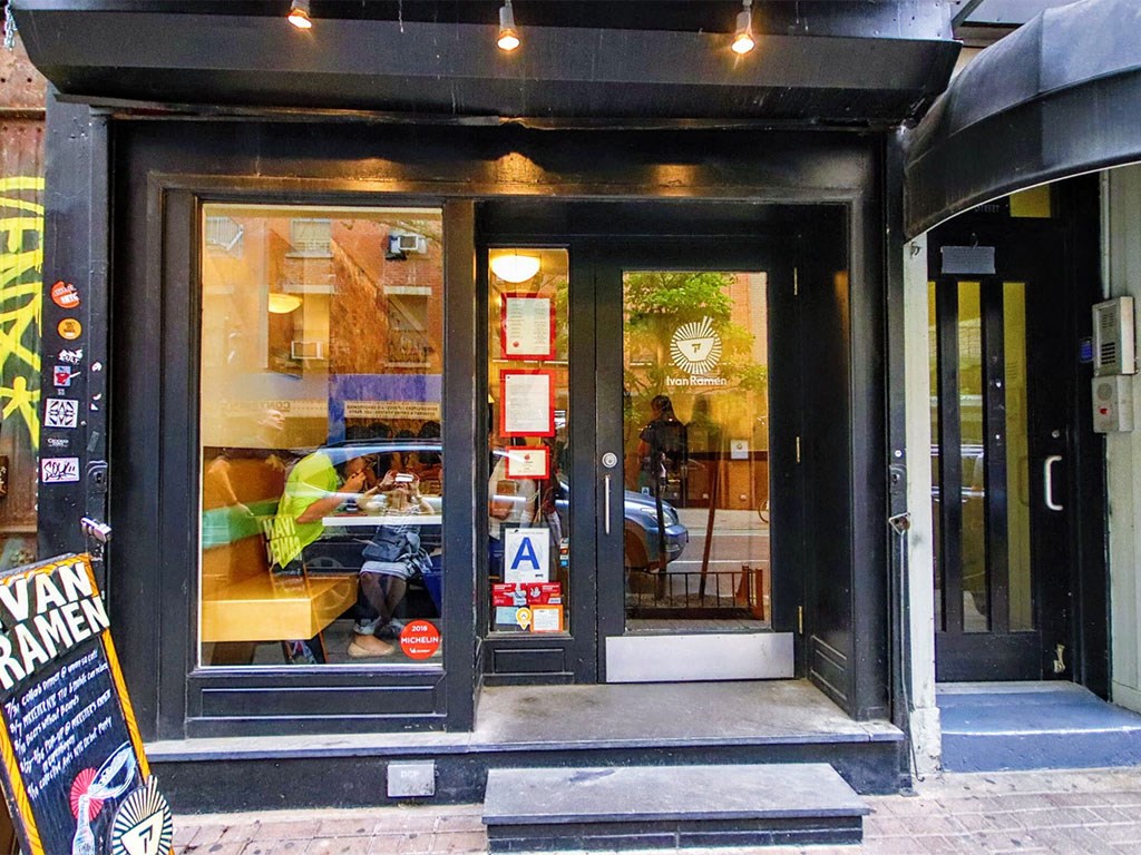 a view of the front of a restaurant with doors