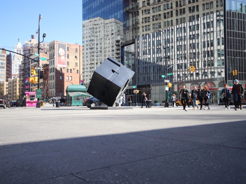 a piece of furniture in the middle of a city street