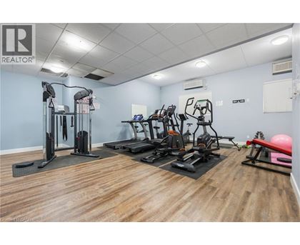 A well-equipped gym with a variety of exercise machines.