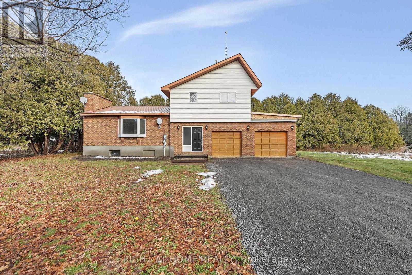 A house with a driveway and a garage door.