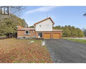 A house with a driveway and a garage door.
