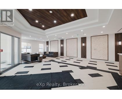 A spacious room with a black and white checkered floor and wooden ceiling.