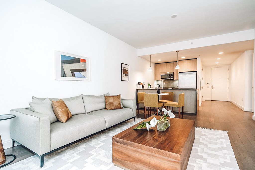a living room with a couch and a coffee table