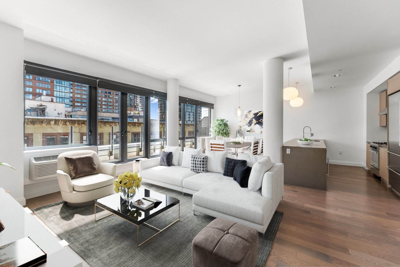 a living room with a white couch and a table