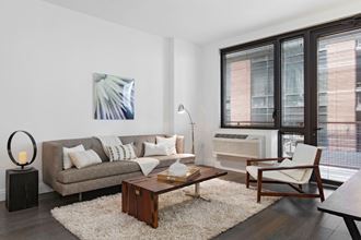 a living room with a couch and a coffee table