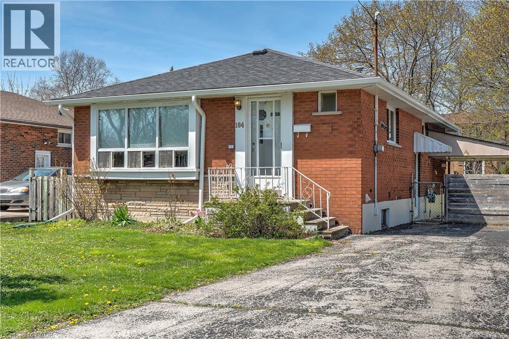 A house with a realtor logo in the corner.