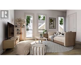A living room with a couch, a coffee table, and a television.