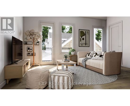 A living room with a couch, a coffee table, and a television.