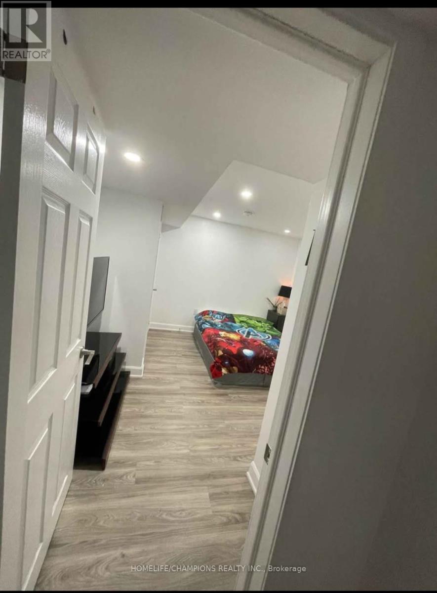 A room with a bed and a TV in it.