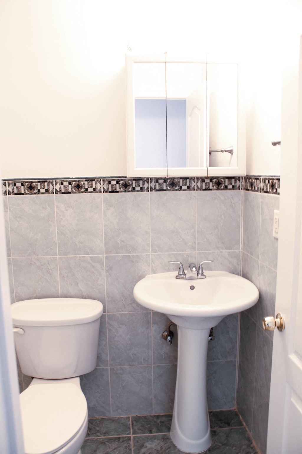 a small bathroom with a toilet and a sink