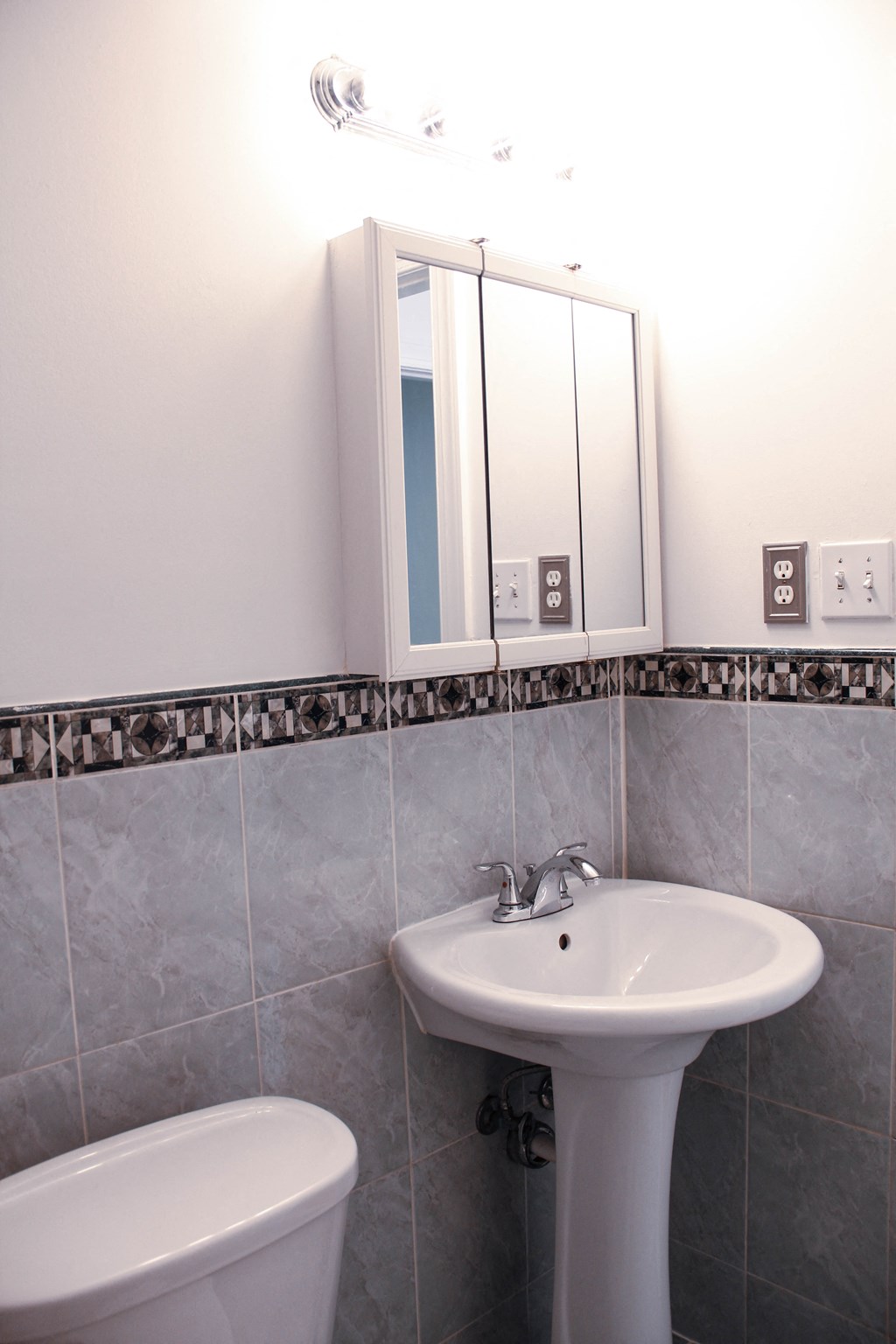 a small bathroom with a sink and a toilet