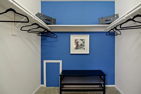 a blue and white room with a blue wall and a black table