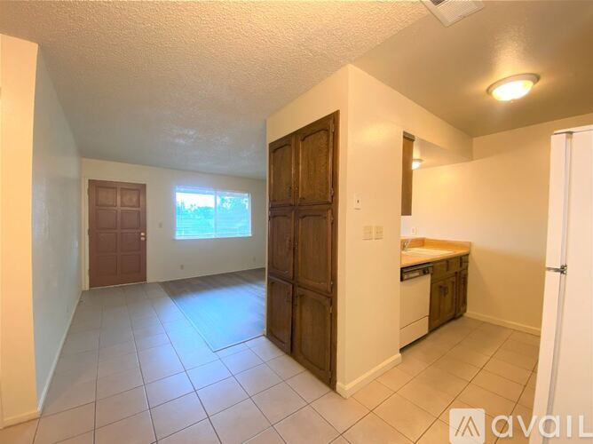 Source URL: https://prod-avail.s3.amazonaws.com/public_images/35352697/listing/4-kitchen_and_living.JPG