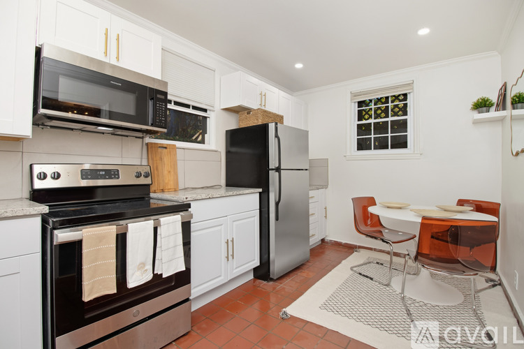 A kitchen with a sink and a faucet.