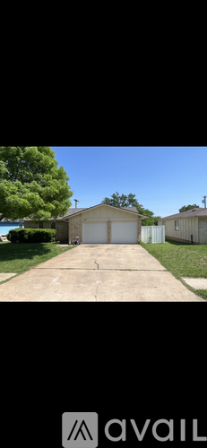 A house with a garage is available for rent.