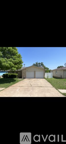A house with a garage is available for rent.