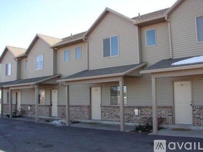 A row of houses with the word AVAILABLE on the bottom right.