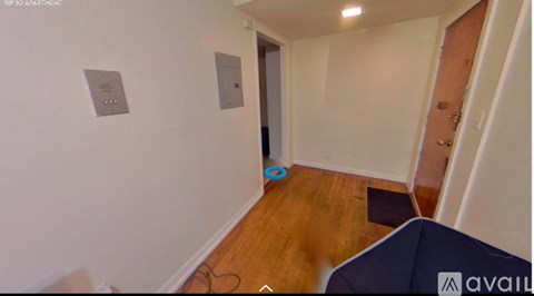 A room with a blue object on the floor.