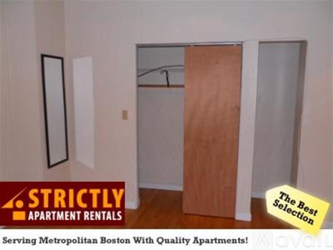Apartment rental service in Boston with a sign that says "The Best Selection".