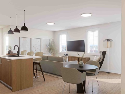 A modern kitchen with a dining table and chairs.