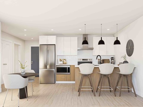 A modern kitchen with a bar stool and a dining table.