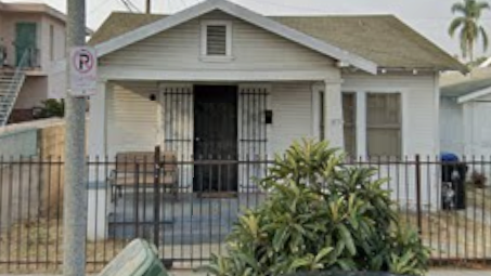 A house with a P sign in front of it.