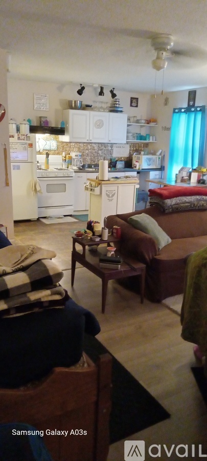 A living room with a couch and a coffee table.