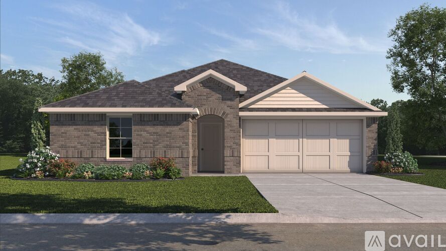 A house with a garage is available for sale.
