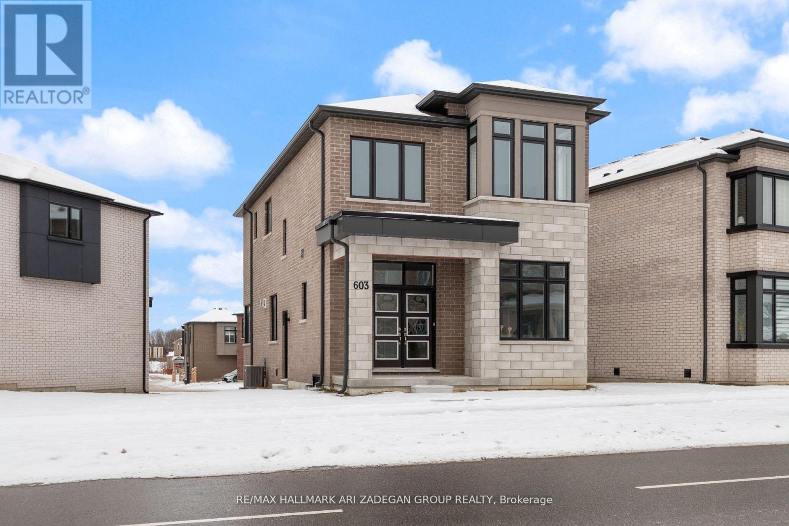 A building with the number 603 on it is part of a real estate group.