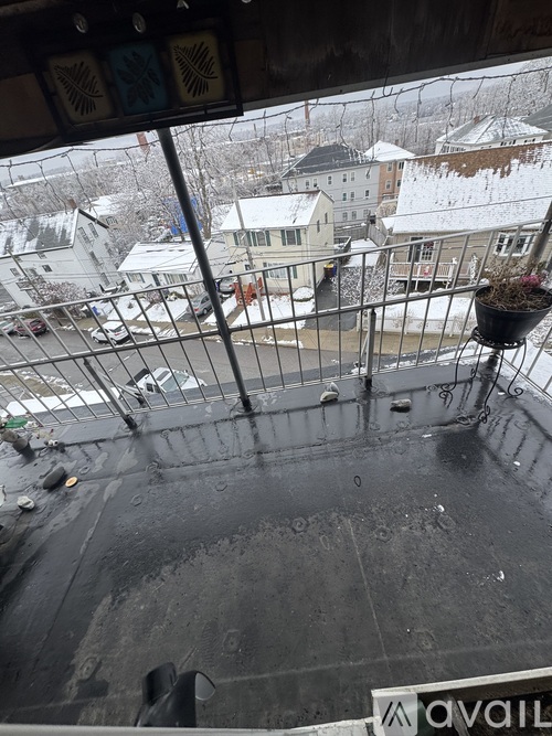 A view from a high vantage point looking down at a snowy landscape.